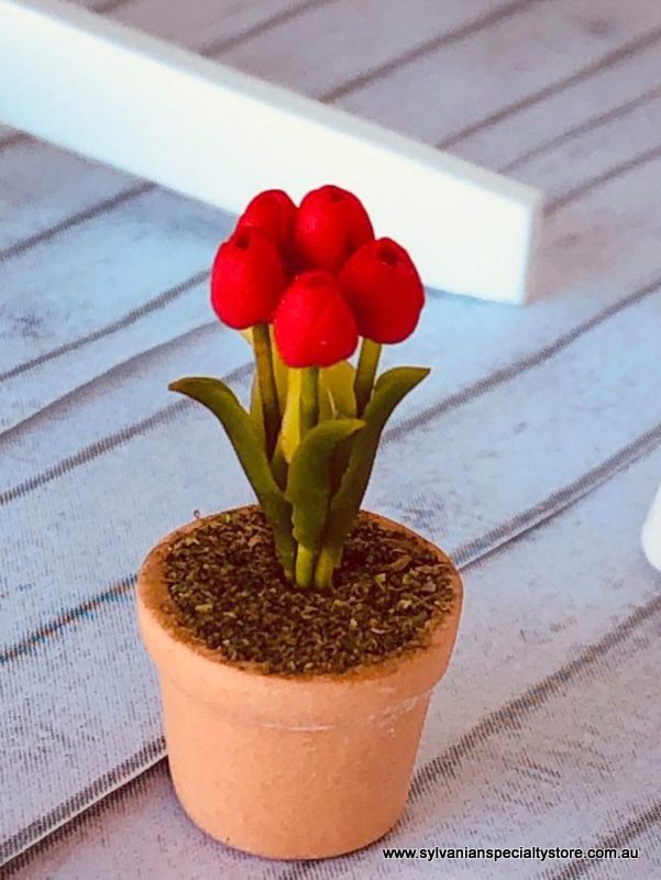 Dollhouse miniature red tulip flower in pot