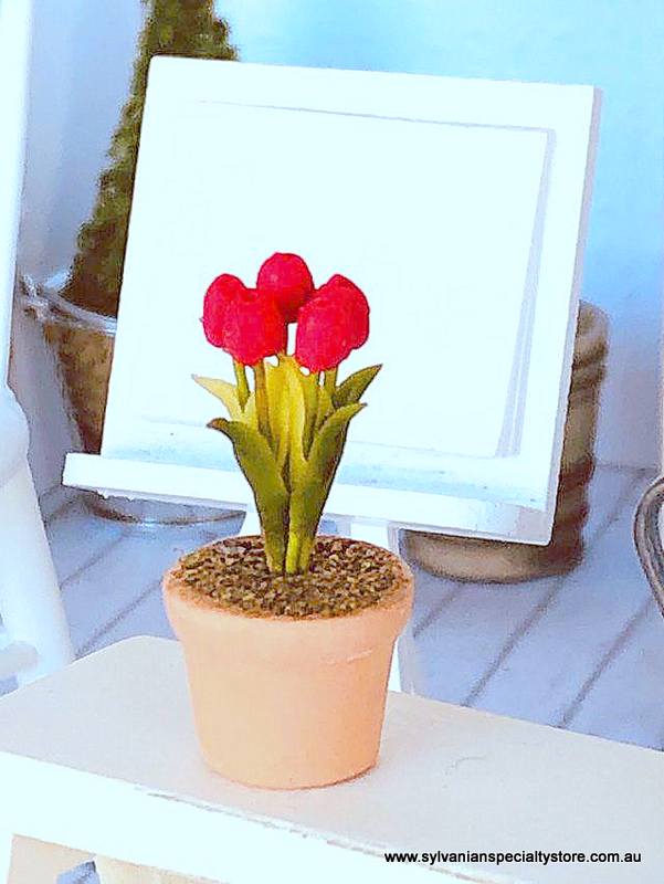 Dollhouse miniature red tulip flower in pot