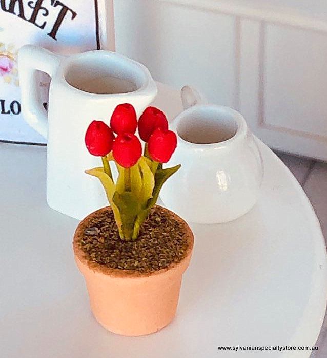Dollhouse miniature red tulip flower in pot