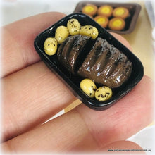 Dollhouse miniature roast beef in pan with potatoes