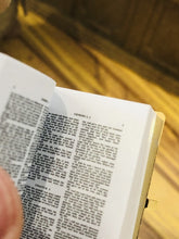 Gold Bible with writing inside