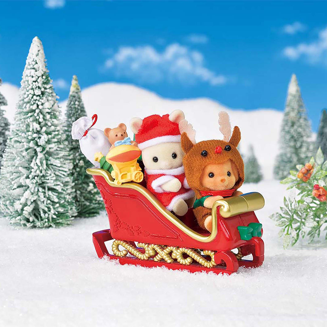 Sylvanian Families Limited edition Christmas set with 2 adorable babies in Santa Claus and reindeer costumes Set includes a sleigh, a present sack, toys and gift boxes