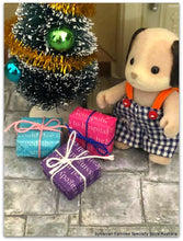 Sylvanian Families Beagle Christmas gifts wrapped with string