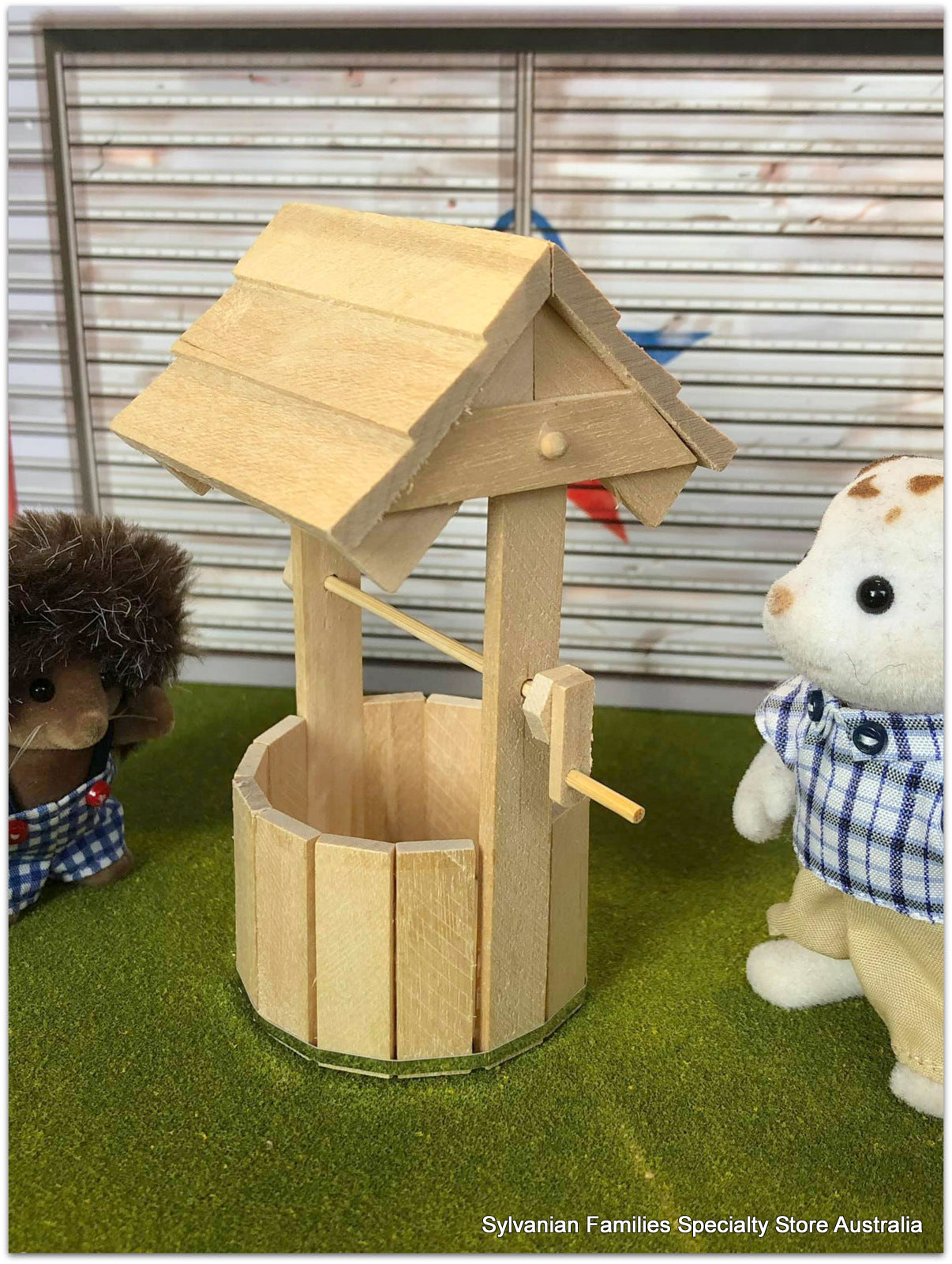 Sylvanian Familes alongside Wishing well
